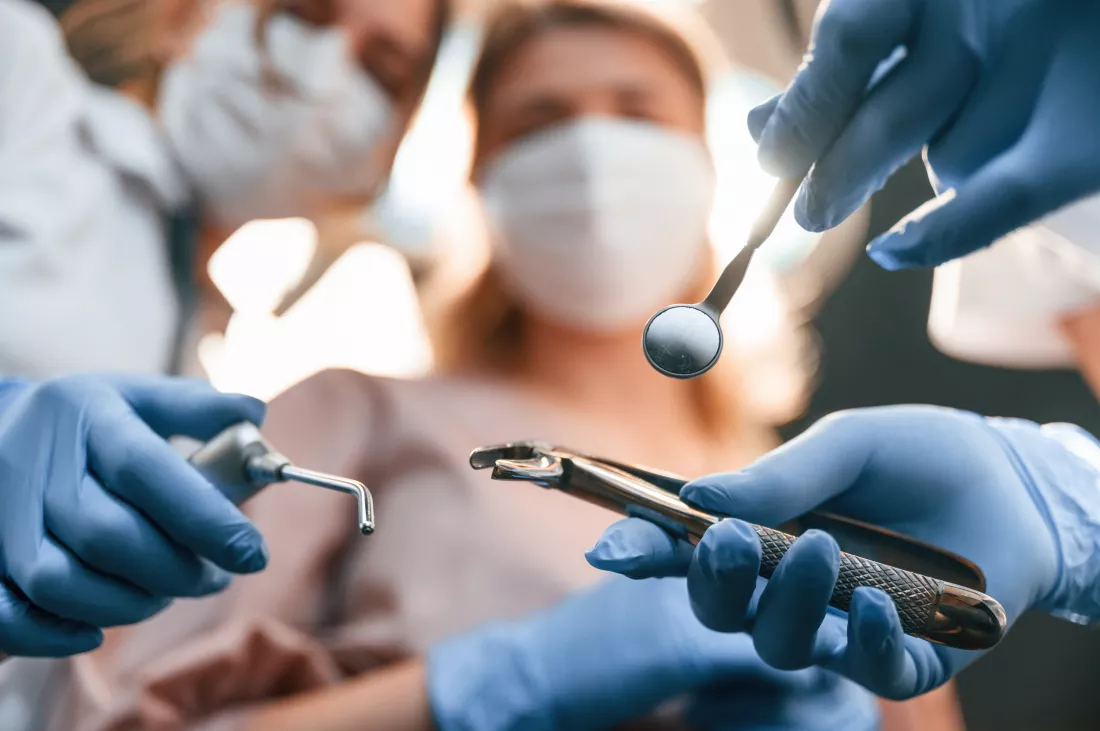 first-person-view-three-doctors-are-working-stomatological-cabinet